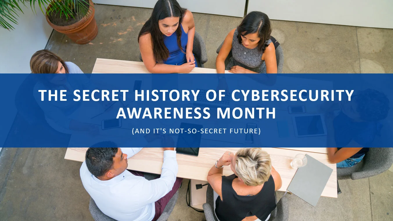 An image of individuals around a conference table with an overlay stating "The Secret History of Cybersecurity Awareness Month (And its not-so-secret-future)"