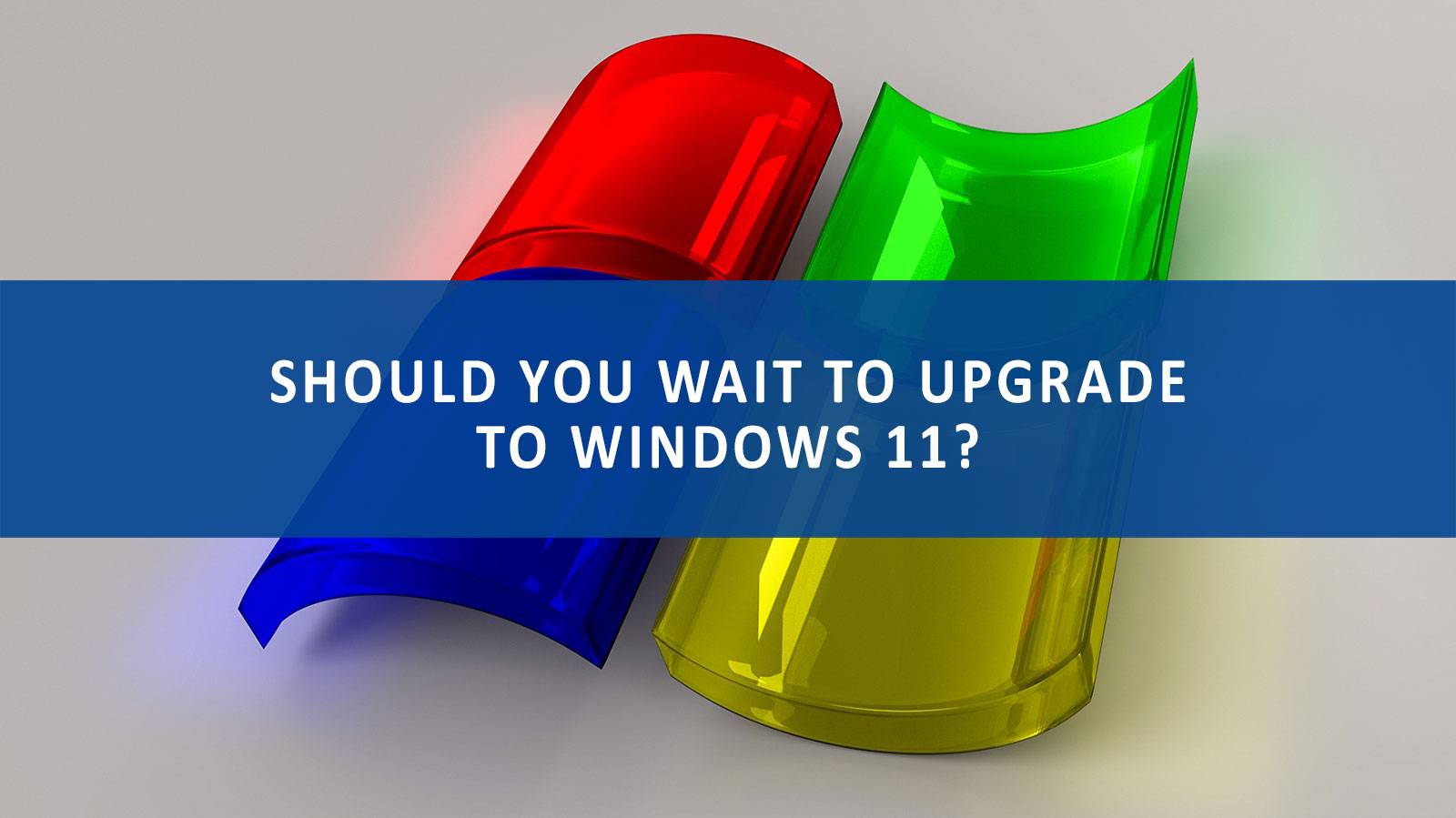 3d graphic of the Windows logo illustrating the need to wait to upgrade to Windows 11
